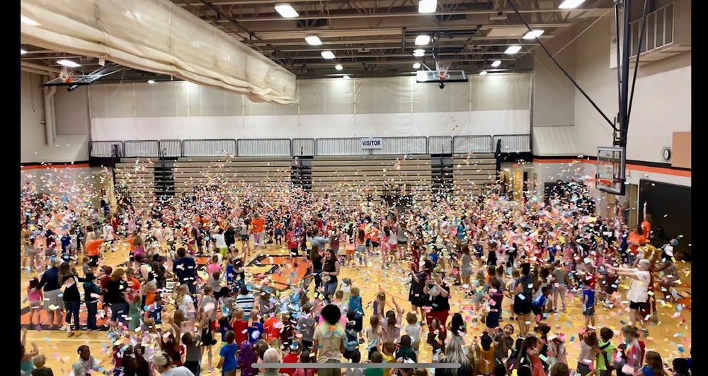 Students throwing confetti