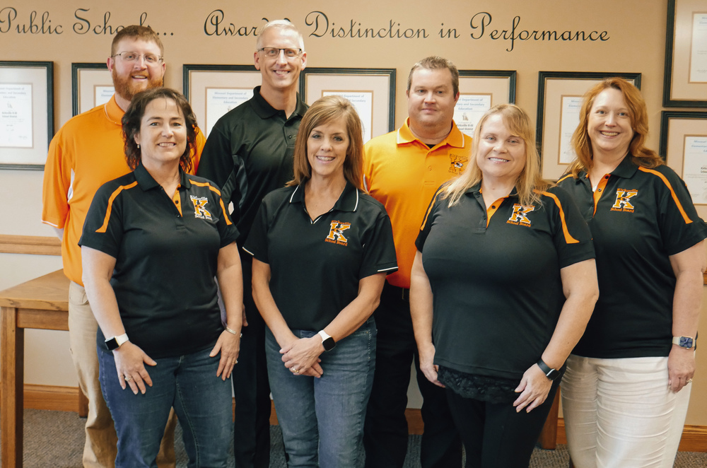 Board members wearing Kirksville color shirts
