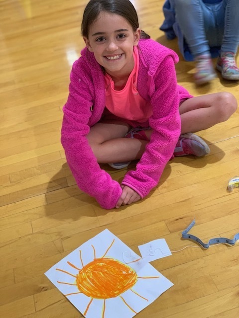 Student working on a solar system project