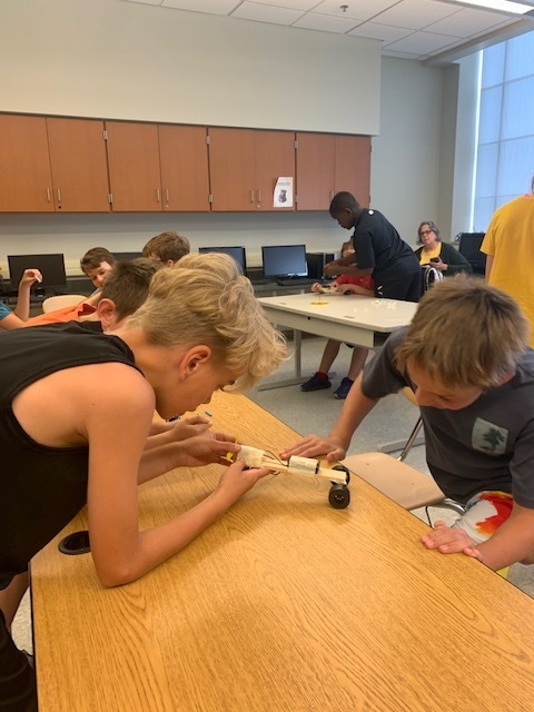 Students working on robot cars